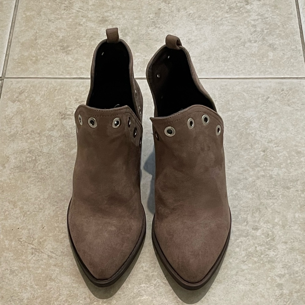 New in box. (Missing lid) Taupe / Tan suede booties with silver. Size 7.
